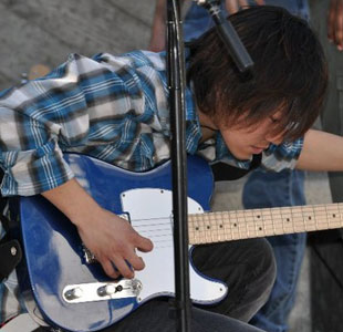 Kyohei rocking the stage for the Music Committee